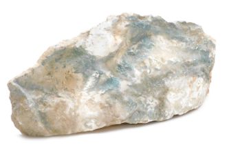 A slab of rough hewn marble, with blue and white colouring, 51cm wide.