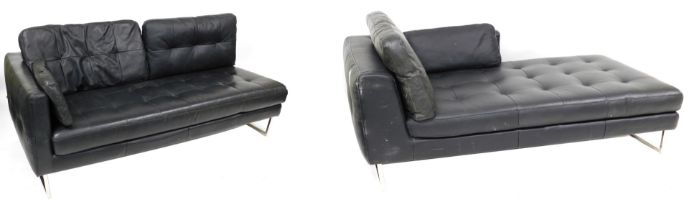A Dwell black leatherette upholstered corner settee, 246cm wide.