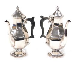 A pair of silver plated coffee pots, of octagonal baluster form, by Edward and Sons of Glasgow, 20cm