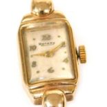 A Rotary lady's 9ct gold cased wristwatch, rectangular cream dial, with Arabic numerals at evens, th
