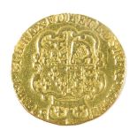 A George II gold guinea 1781, the obverse with laureate head, reversed with crowned shield of arms,