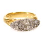 An 18ct gold and diamond cluster ring, in a channeled oblong design, high scroll set, approx 0.5ct