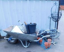 A quantity of gardening items, including a wheelbarrow, buckets, tools, hanging baskets, plant pots,