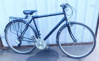 A gentleman's black bicycle, made by Raleigh.