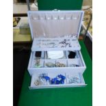 Costume jewellery in a jewellery box, to include pendants, necklaces, brooches, etc.