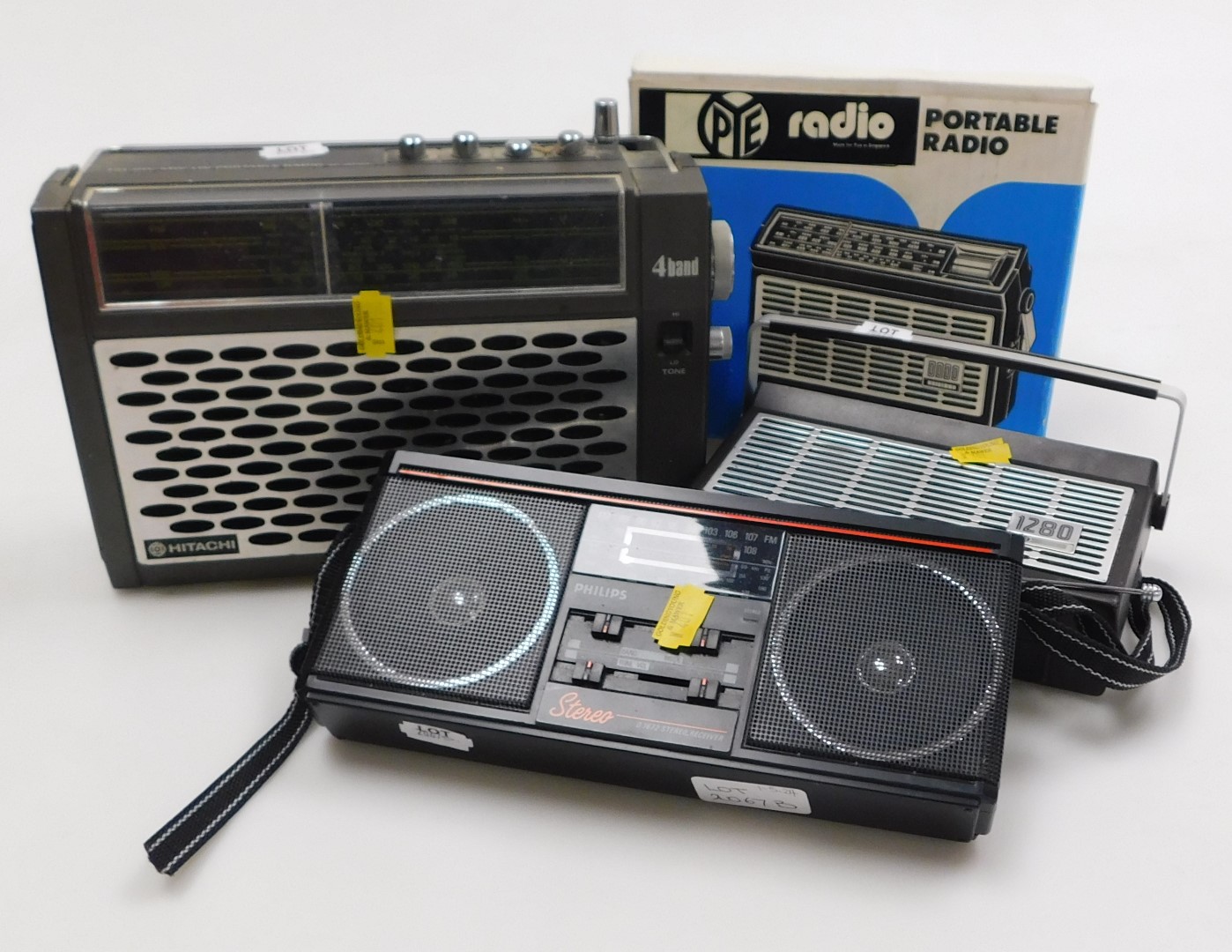 Portable radios, in the form of Pye radio, model 1280, a Philips stereo receiver and a four band rad