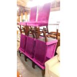 A set of eight purple velour upholstered dining chairs, raised on square supports, joined by stretch