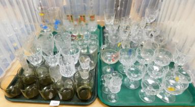 Glassware, including large etched glass drinking glasses, wine glasses, smoked glass tumblers, desse