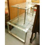 Two glass coffee tables, glass and metal bases, the largest approx 43cm high, 90cm wide, 40cm deep,