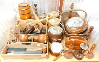 Treen ware, including three biscuit barrels, barometer, baskets, candlesticks, cutlery, trays, etc.