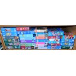 Approx thirty one jigsaw puzzles, to include In Full Bloom, Fury Friends, etc. (1 shelf)