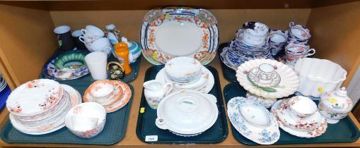 Assorted ceramics, including tea services, large dinner plates, smaller plates, and associated wares