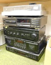 A stereo system including a Hitachi direct drive turntable, model HT-405, a Teknix compact disc play