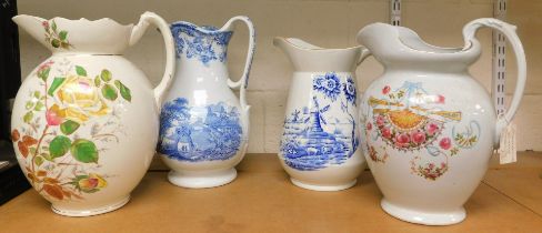 Four large ceramic blue and white water jugs, one Staffordshire and one plain water jug with no mark