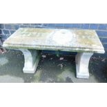 A two seater stoneware garden seat, with twin pedestals, seat above, 46cm high, 100cm wide, 40cm dee