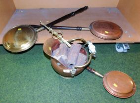 Three warming pans, and a helmet shaped coal scuttle.