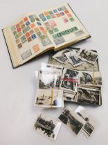 A Victory stamp album, selection of cigarette cards, including Senior Service in a tin.