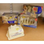 Lurpak collectibles, boxed, including a toast rack, egg cups and a butter dish with cover.