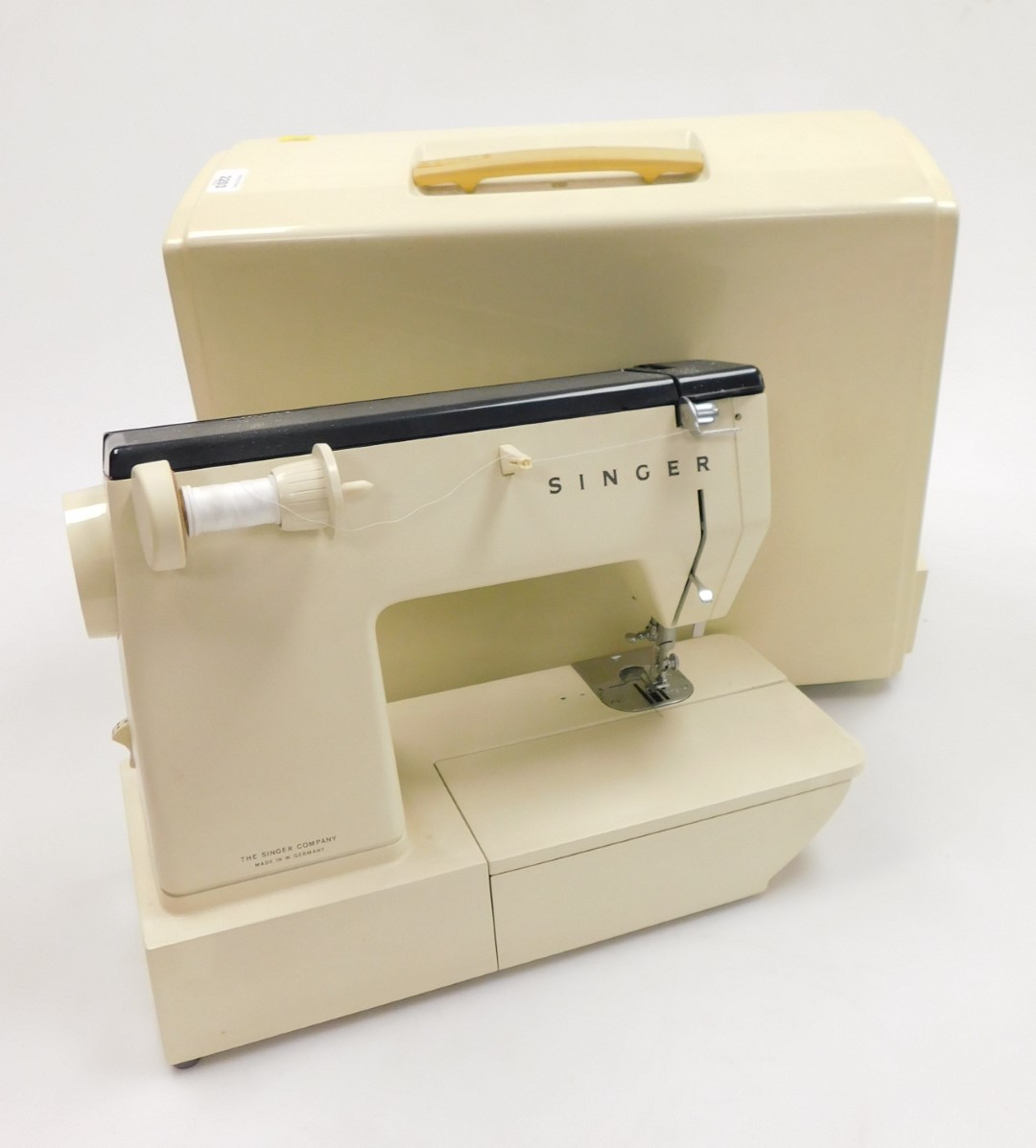 A cased Singer sewing machine circa 1960s.