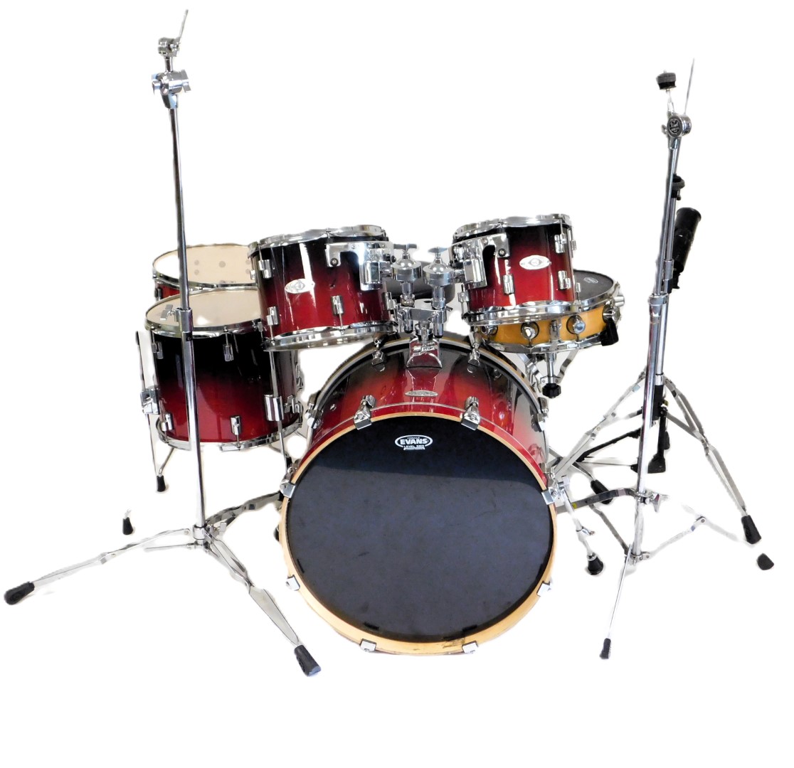 A Drum Craft drum kit, with remo drum heads, including a snare drum, floor tom, another floor tom, b