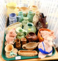 Ceramics, including a shorter shell vase, character jugs, glug jug and NatWest Wade piggies, the lar