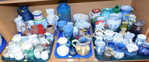 A large selection of water jugs, all ceramic, and goblets, mainly water jugs, makes include Price an