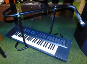 A Casio Sound Tone bank keyboard, model number CT420, with stand.