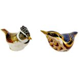 Two Royal Crown Derby porcelain bird paperweights, comprising Nuthatch, red printed marks and silver