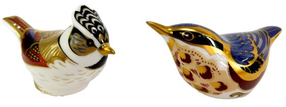 Two Royal Crown Derby porcelain bird paperweights, comprising Nuthatch, red printed marks and silver
