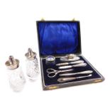 A George V presentation silver manicure set, comprising buffer and pot and various implements,