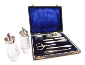 A George V presentation silver manicure set, comprising buffer and pot and various implements,