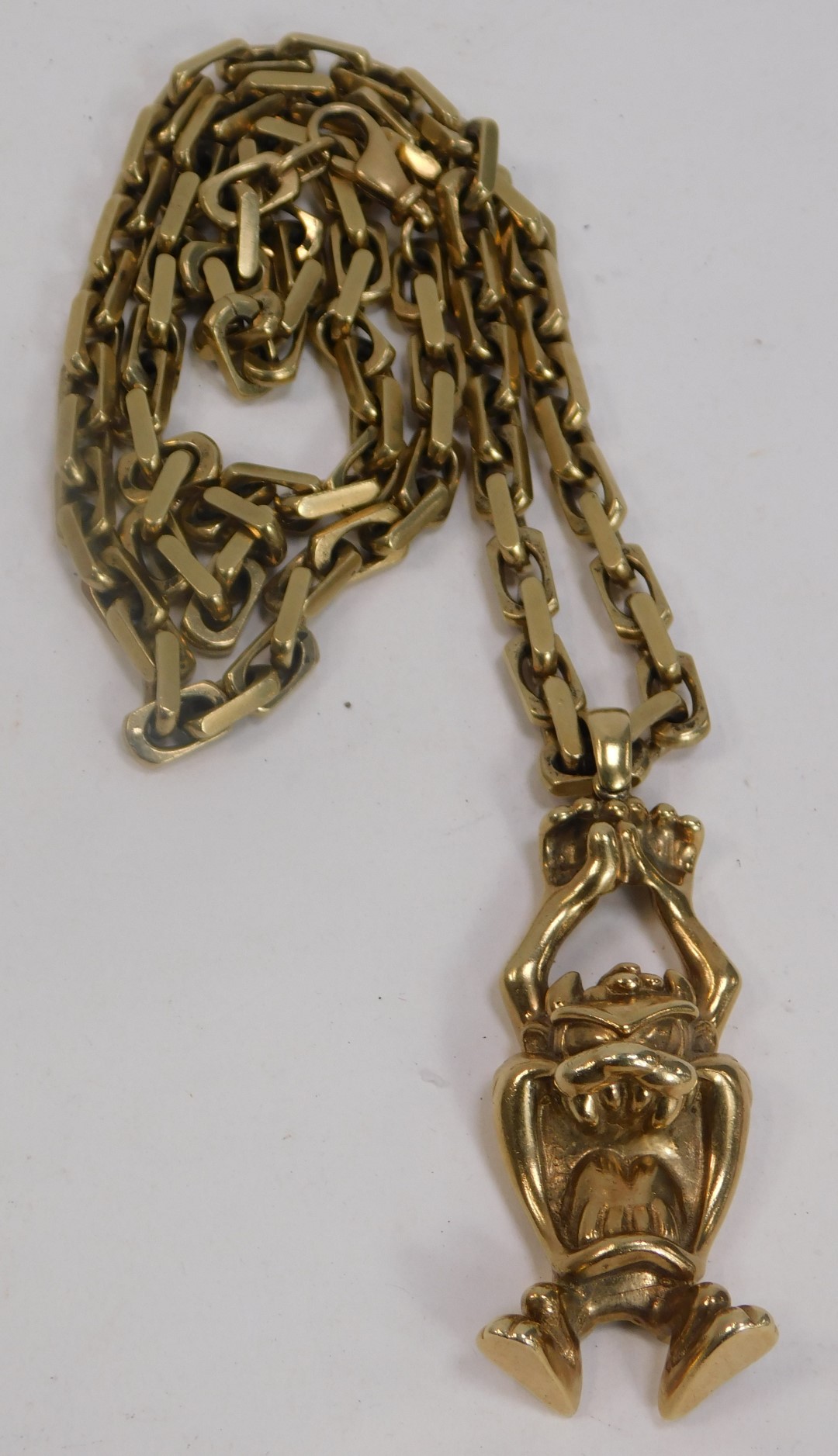 A 9ct gold Tasmanian devil pendant and chain, the taz bearing maker BBD, Sheffield 1958, 7.5cm high, - Image 2 of 2