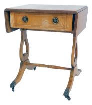 A mahogany drop leaf side table, in Regency style, the top with a moulded edge with frieze drawer,