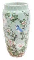 A 20thC Oriental porcelain vase, of cylindrical form, decorated in coloured enamels depicting