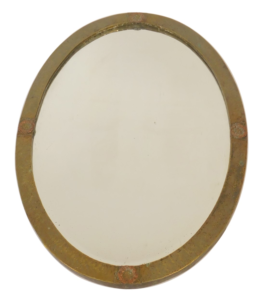 An early 20thC hammered brass oval wall mirror, with copper laurel leaf decoration at four points,