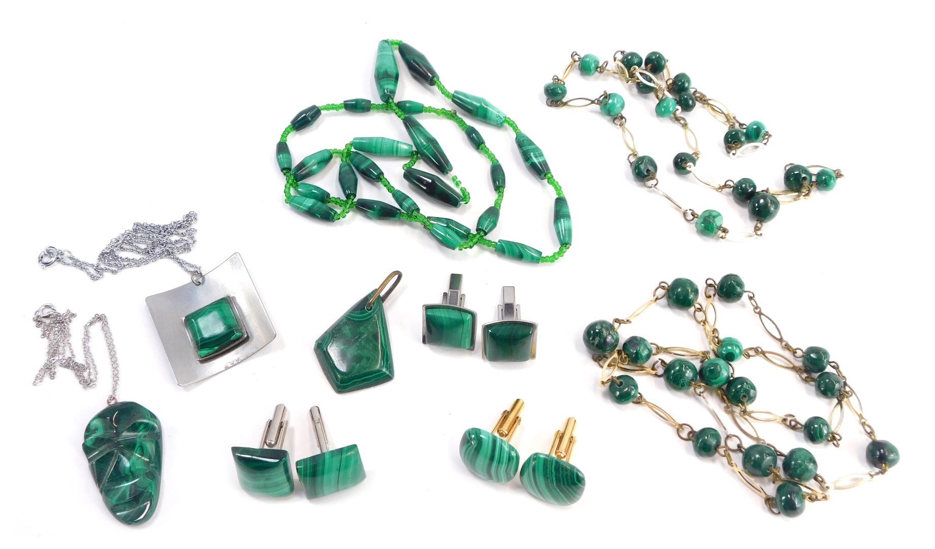 A collection of malachite jewellery, comprising a graduated malachite and green beaded necklace, a