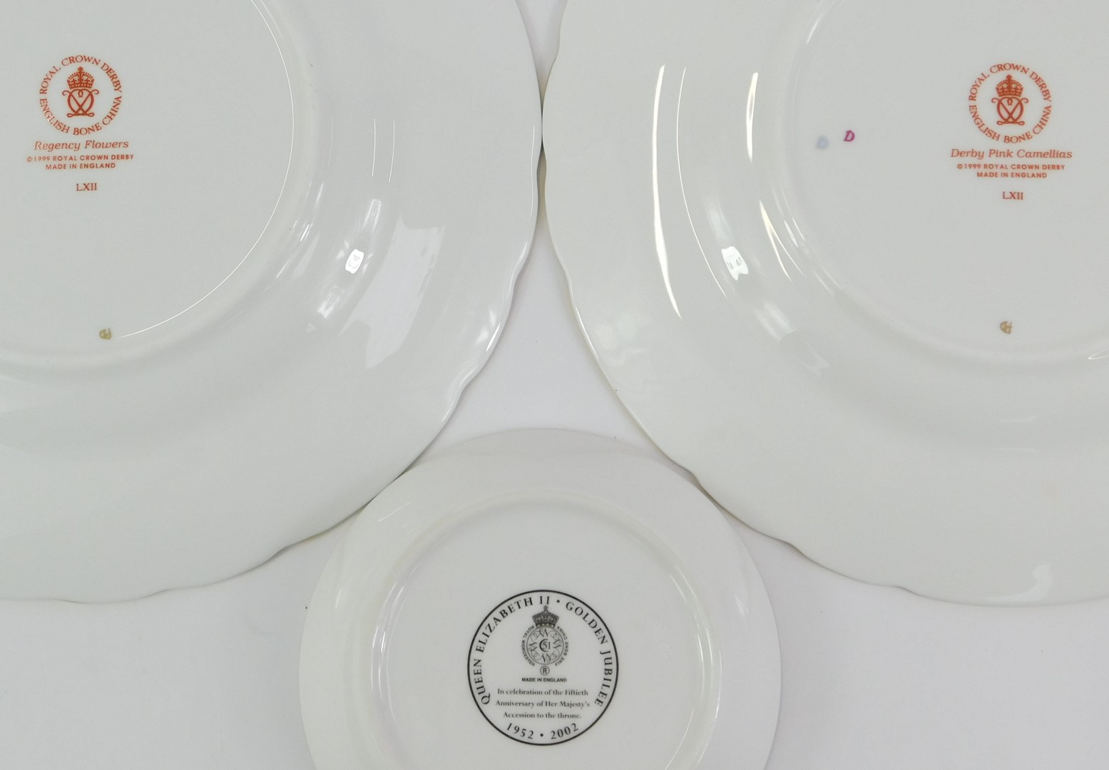 Two Royal Crown Derby porcelain plates, decorated in the Regency Flowers pattern, and the Derby Pink - Image 3 of 3