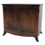 A mahogany collectors cabinet, the two panelled doors enclosing seven shallow drawers, on out