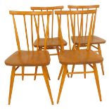A set of four Ercol elm and beech dining chairs, model number 391, some bearing labels and each
