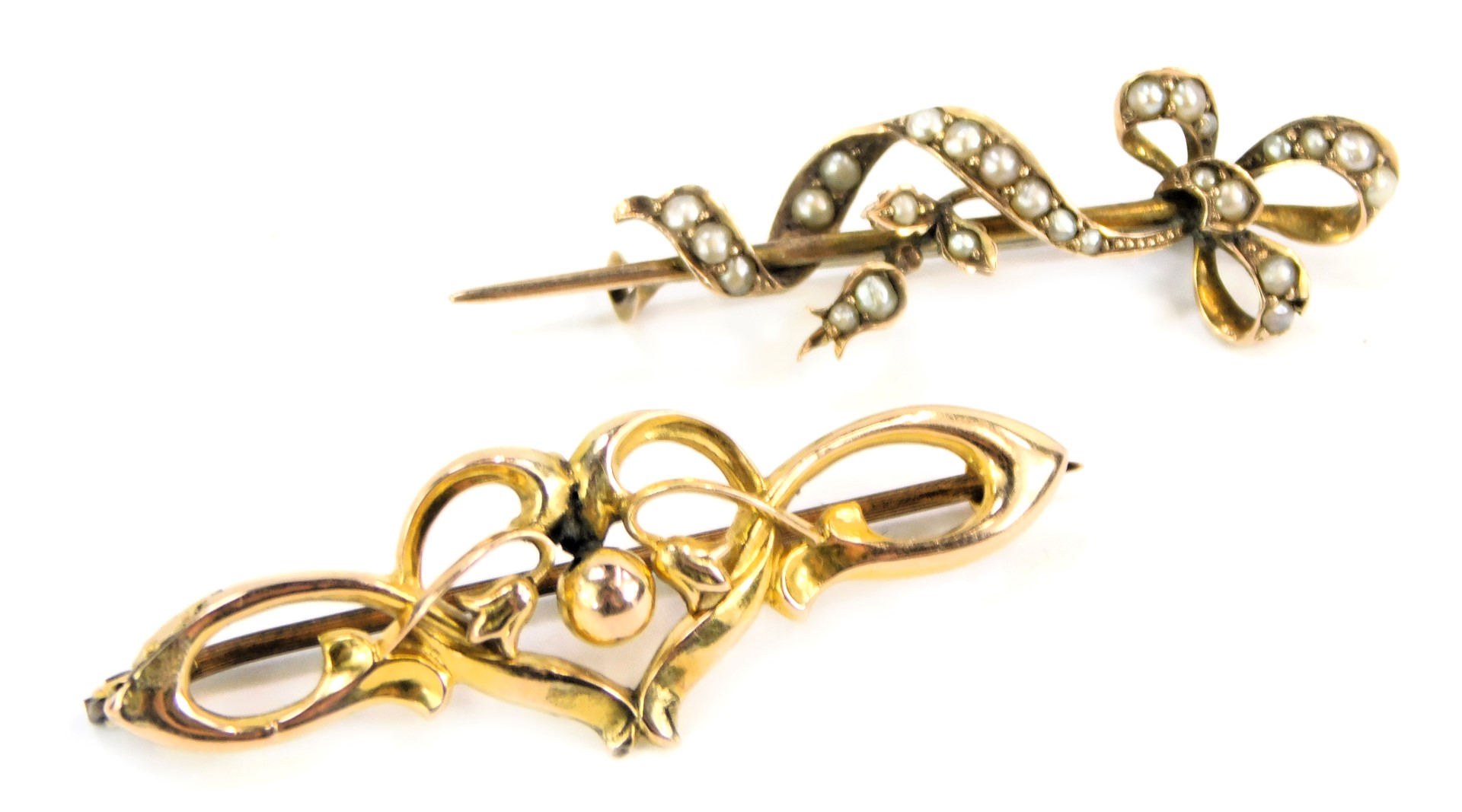 Two bar brooches, comprising a heart and tulip shaped bar brooch, yellow metal frame stamped 9c,