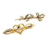 Two bar brooches, comprising a heart and tulip shaped bar brooch, yellow metal frame stamped 9c,