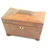 A Regency rosewood sarcophagus shaped tea caddy, the hinged lid enclosing two lidded compartments,