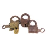 A group of locks, comprising two 19thC cast iron examples, another cast iron and brass example