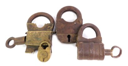 A group of locks, comprising two 19thC cast iron examples, another cast iron and brass example