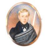 A 19thC portrait brooch, of oval design, the miniature painted oval panel depicting blonde haired