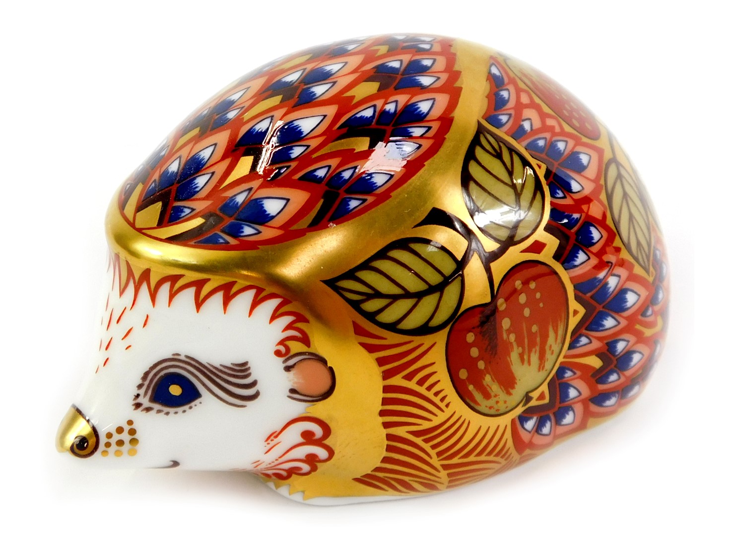 A Royal Crown Derby porcelain orchard hedgehog paperweight, an exclusive for the Royal Crown Derby