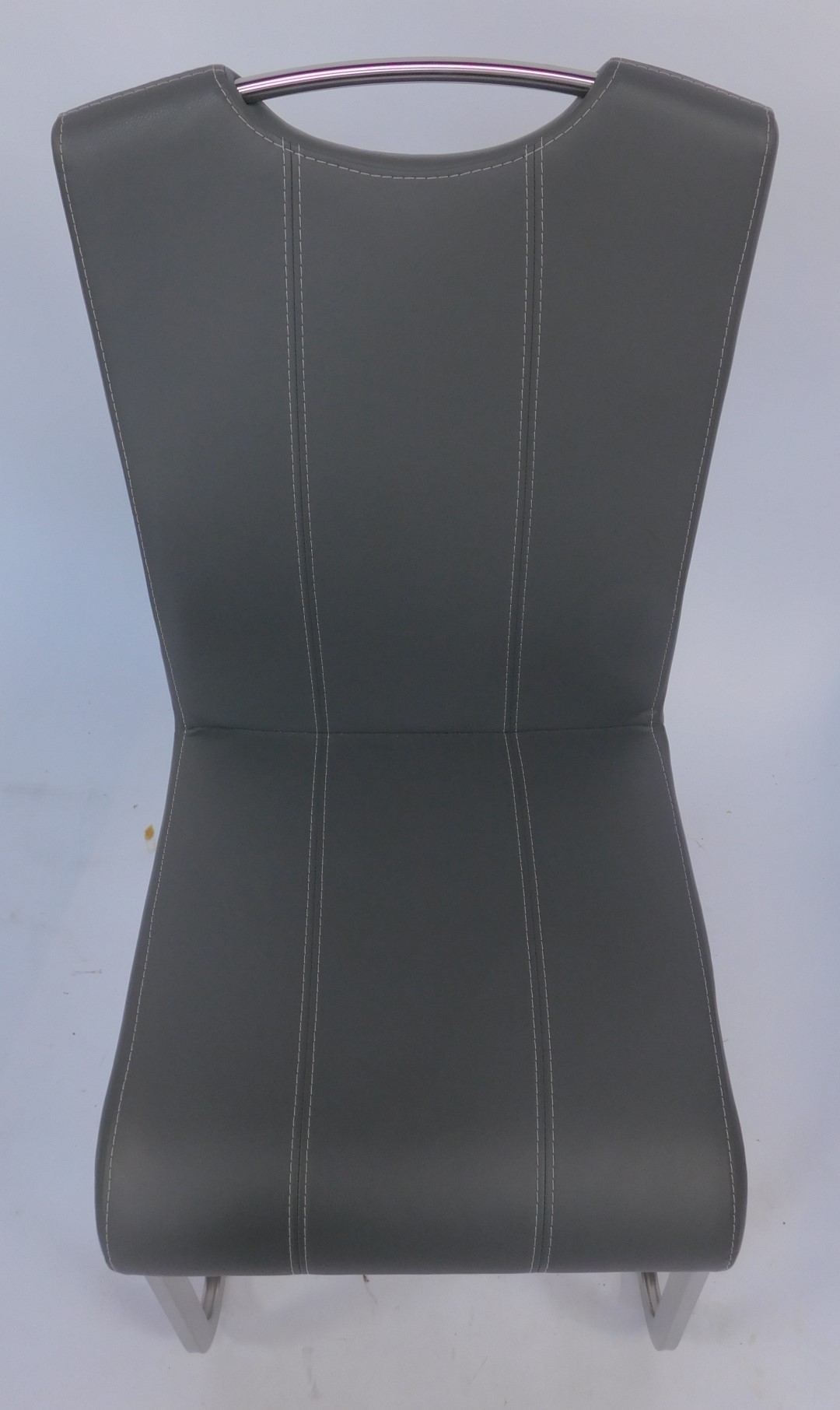 A set of six modern dining chairs, each with a grey leatherette seat and back, with cream stitching, - Image 2 of 2