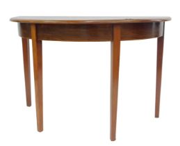 A late 19thC mahogany and cross banded D end table, raised on square tapering legs, 73cm high, 107cm