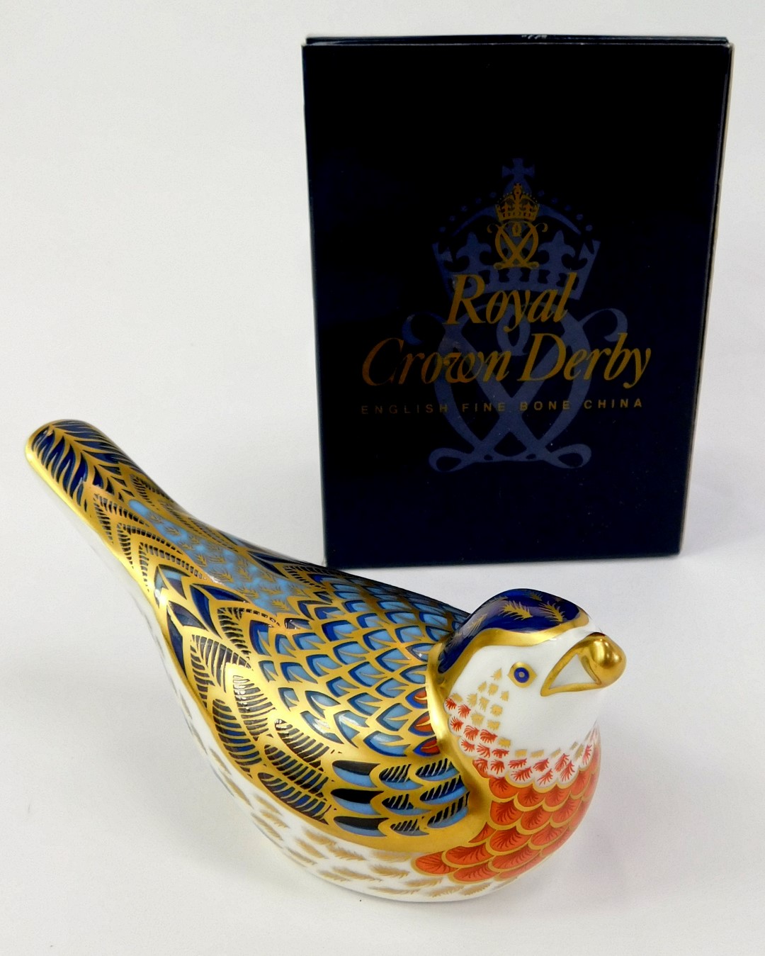 A Royal Crown Derby porcelain bluebird paperweight, red printed marks and gold stopper, 6.5cm - Image 2 of 3