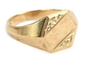 A 9ct gold signet ring, with hexagonal ring head, with partially hammered border and central